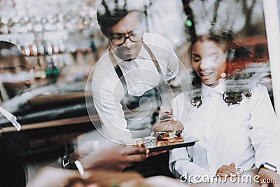 Barman. Burger. Black Man. Date. Girl . Cafe. Stock Photo