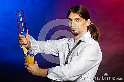 Barman showing his skills. Stock Photo