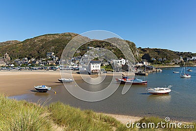 Barmouth Gwynedd North Wales coast town with boats and harbour and mountains Stock Photo