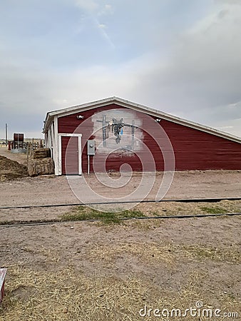 barn art at Terry Bison Ranch Cheyenne Wyoming Beautiful clouds , sky lanscape Editorial Stock Photo