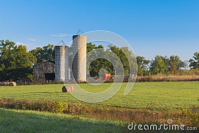 Barn, Silos, and Wagon Stock Photo