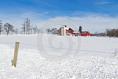 Barn in Snow Covered Meadow Editorial Stock Photo