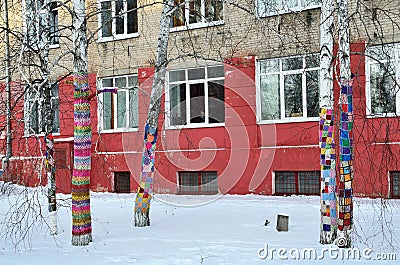 Barnaul, Russia, January, 14, 2016, Nobody, trunks of birch trees, decorated with bright paintings tied hook Editorial Stock Photo