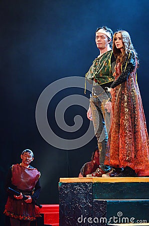 Theater actors in costumes play in the play `Plague on both your houses` Editorial Stock Photo