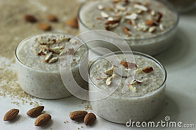 Barnyard millet porridge. An easy and healthy porridge for breakfast with barnyard millet, milk and almonds Stock Photo