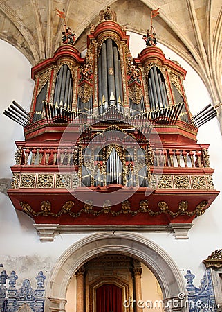 Baroque pipe organ of the 18th century inside the church of Monastery of Santa Cruz, Coimbra, Portugal Editorial Stock Photo