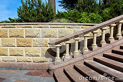 Baroque staircase with marble steps and stone balustrades. Stock Photo