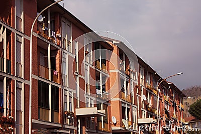 Barracks and buildings of public houses built with a cold red brick Stock Photo