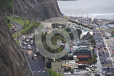 Barranco coast with Pacific Ocean beach with the historic restaurant - Rosa Nautica - and a highway with traffic Stock Photo