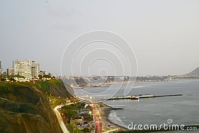 Barranco Peru coast with Pacific Ocean beach with the historic restaurant - Rosa Nautica - and a highway with traffic Stock Photo