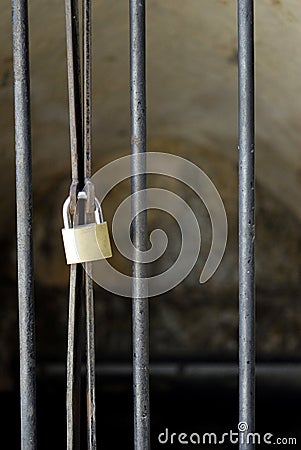 Barred Gate with Padlock Stock Photo