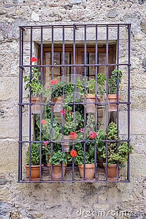 Barred window with in Pedraza Spain Stock Photo