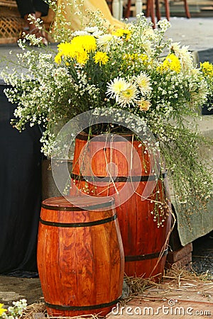 barrel for romantic indoor decoration with fresh flowers Stock Photo