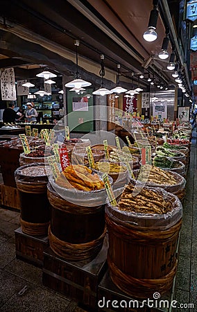 The barrels with Japanese pickles tsukemono on the market. Kyoto. Japan Editorial Stock Photo
