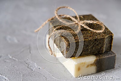 Bars of natural soap with dried herbs Natural Herbal Products. Spa Stock Photo