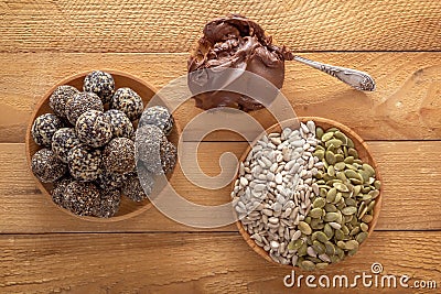 Bars of sports nutrition from nuts, seeds and chocolate paste - vegetable natural protein, a mixture of dried fruits, Stock Photo