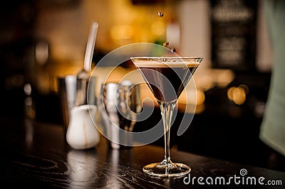 Bartender decorated espresso cocktail drink white foam coffee bean Stock Photo