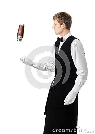 Bartender juggling with shaker and making cocktail Stock Photo