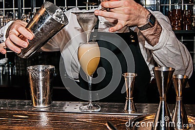 Bartender makes a cocktail Stock Photo