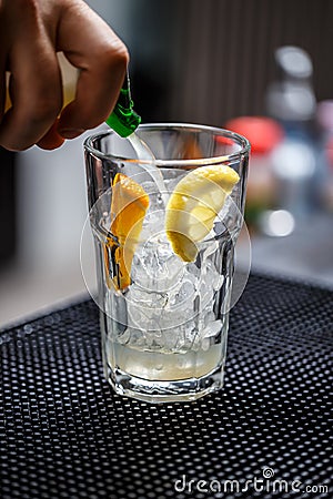 Bartender is pouring soda water Stock Photo
