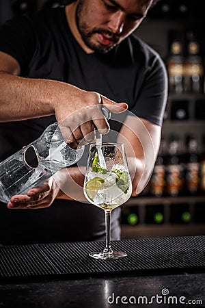 Bartender is pouring soda water Stock Photo