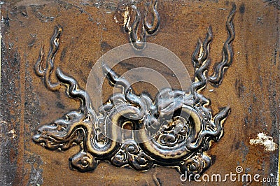 Bas relief, carved brass detail Stock Photo