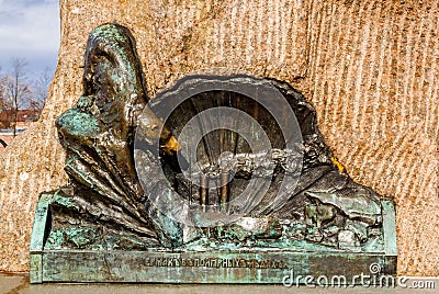 Bas-relief `Icebreaker Ermak in the arctic ice` on the back of the monument to admiral Makarov in Kronshtadt, St. Petersburg, Russ Editorial Stock Photo