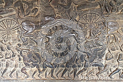 Bas Relief mural of Khmer culture in Angkor Wat temple wall , Cambodia, close up Stock Photo