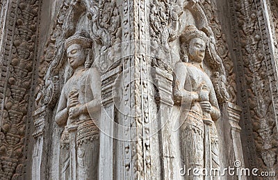 Bas Relief mural of Khmer culture in Angkor Wat temple wall , Cambodia, close up Stock Photo