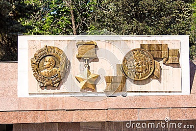 Bas-relief of the Order of Lenin, medal for the defense of Stalingrad on the Alley of Heroes in Volgograd Editorial Stock Photo