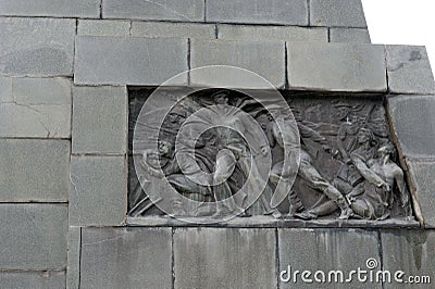 Bas-relief on the pedestal of the monument `Soldiers-defenders of the city of Novorossiysk 1942-1943` on Freedom Square Editorial Stock Photo