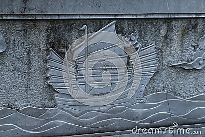 A bas-relief of a ship inside the Temple of Confucius, the largest of the.Yunnan, China. Jianshui, Yunnan, China Editorial Stock Photo