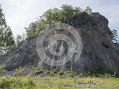 Basalt column pillars, lava vulcanic rock formation organ shape national cultural landmark Zlaty vrch, Jetrichovice Stock Photo