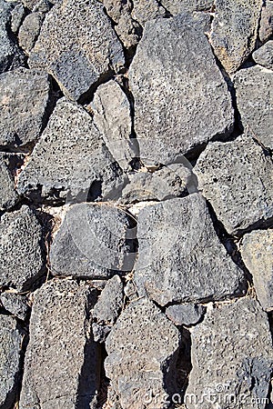 Basalt (volcanic rock) wall made Stock Photo