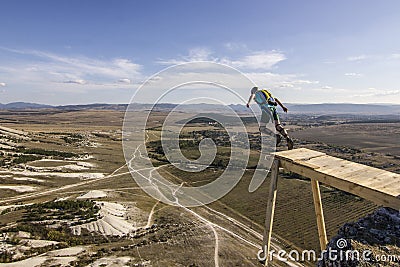 Base-jumper jumps from the cliff Editorial Stock Photo