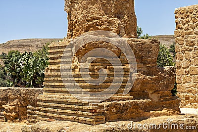 The base of the temple column of Hephaestus, Vulcan. Ancient ruins in the Valley of the Temples, Agrigento, Sicily, Italy Stock Photo