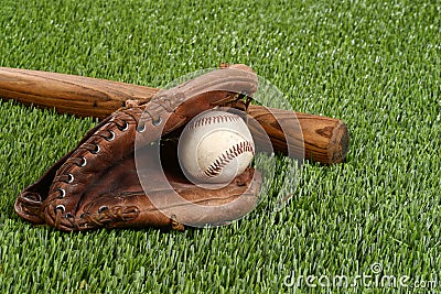 Baseball bat with glove and ball Stock Photo