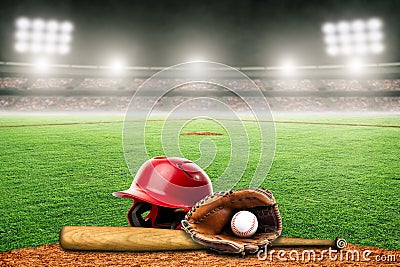 Baseball Bat, Helmet, Glove and Ball on Field in Outdoor Stadium With Copy Space Stock Photo