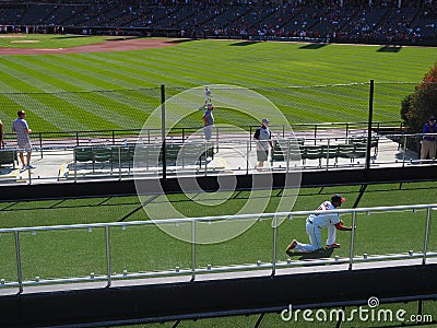 A catcher practicing defense in the bullpen in Cleveland at Progressive Field for the Indians Editorial Stock Photo