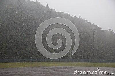 Baseball field in the rain Stock Photo