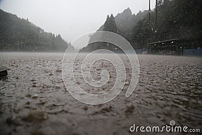 Baseball field in the rain Stock Photo