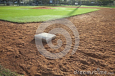 Baseball field infield with first base in the foreground Stock Photo