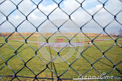 Baseball field under water behind the fence Editorial Stock Photo