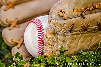 Baseball game mitt and ball Stock Photo