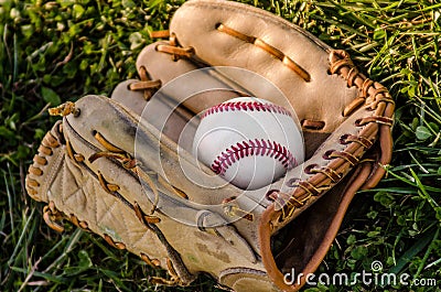 Baseball game mitt and ball Stock Photo