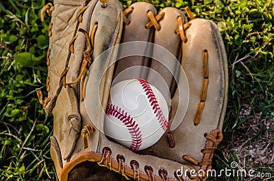 Baseball game mitt and ball Stock Photo