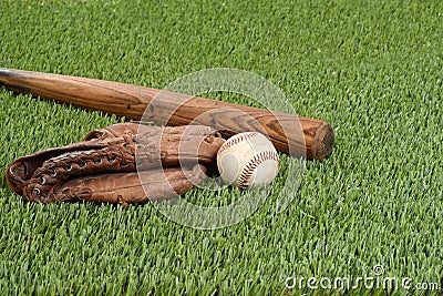 Baseball with glove and bat Stock Photo