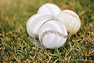 Baseball, grass and ball on baseball field for sport training, fitness and team sports outdoor. Softball, balls and Stock Photo