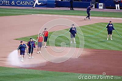 Baseball - Grounds Crew Watering the Field Editorial Stock Photo