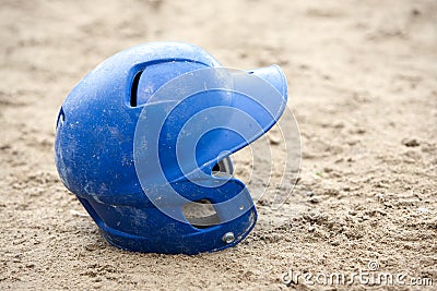 Baseball Helmet in Sand Stock Photo
